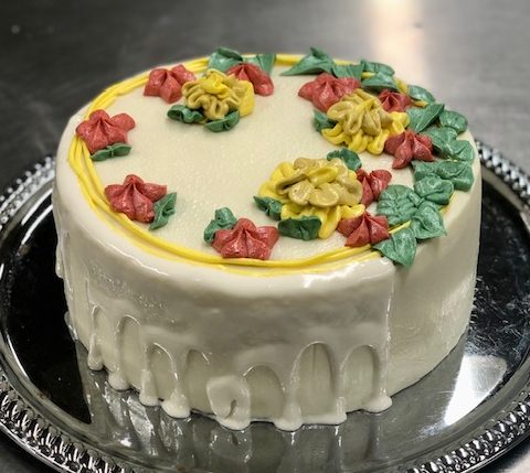 Floral Themed Cake with White Chocolate Drip